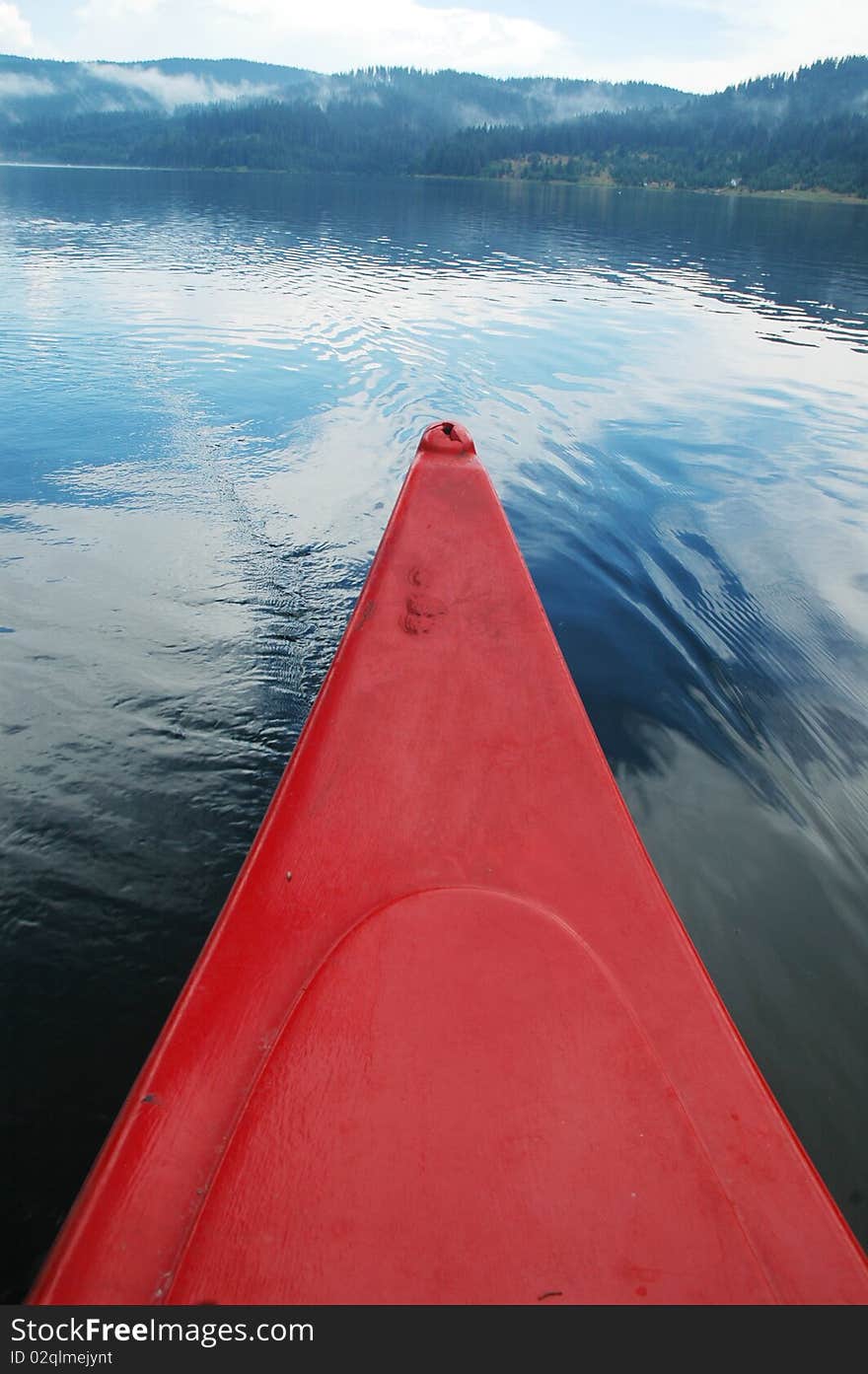 Red canoe near the lake