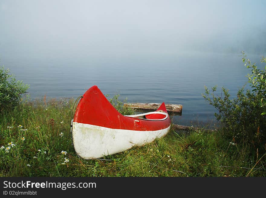 Canoe Near The Lake