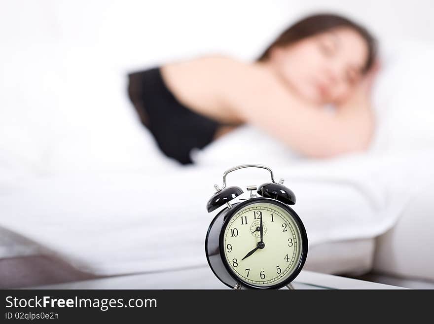 Young adult woman sleeping in bed. Young adult woman sleeping in bed