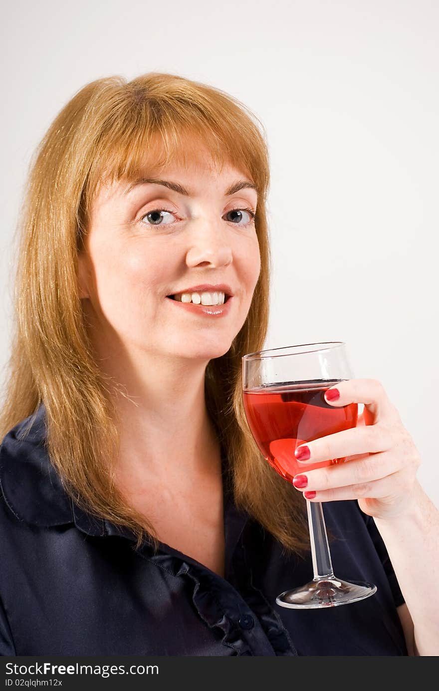 Woman drinking red wine