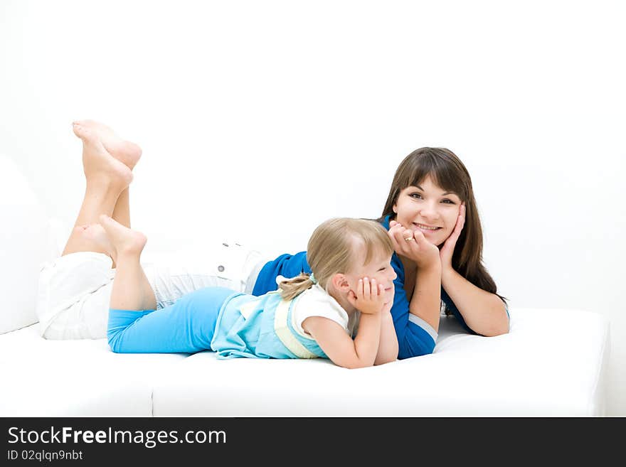 Mother and daughter having fun at home. Mother and daughter having fun at home