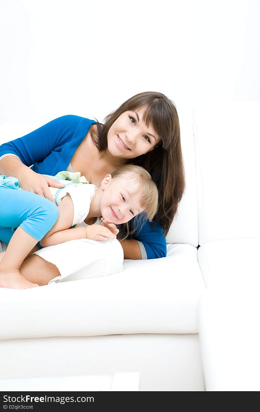 Mother and daughter having fun at home. Mother and daughter having fun at home