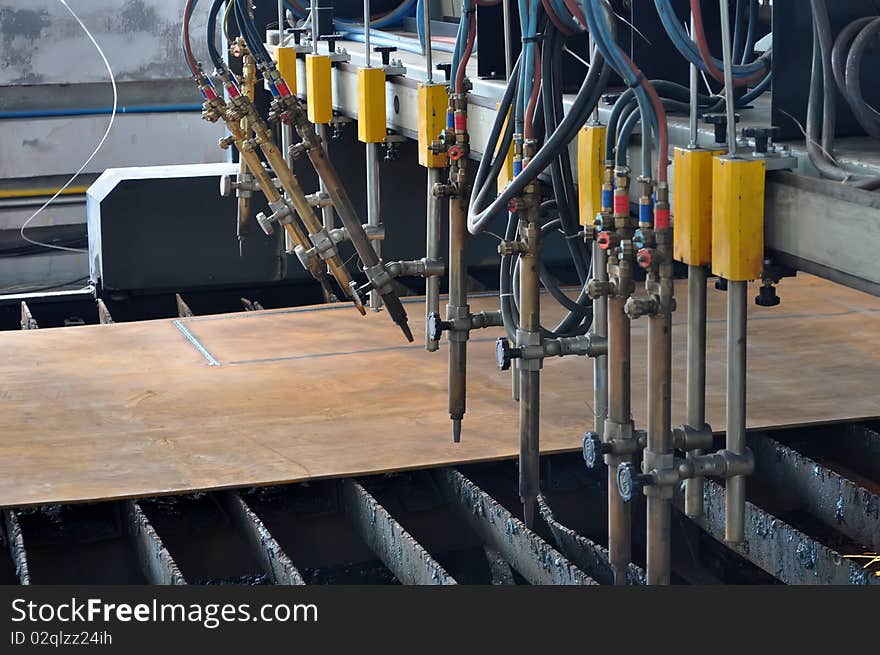 A welding robot was Being cutting a plate,taken in china Photo taken on: Aug 05th, 2010. A welding robot was Being cutting a plate,taken in china Photo taken on: Aug 05th, 2010