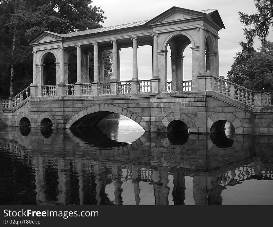 A bridge above the river in the village near saint-petersburg. A bridge above the river in the village near saint-petersburg