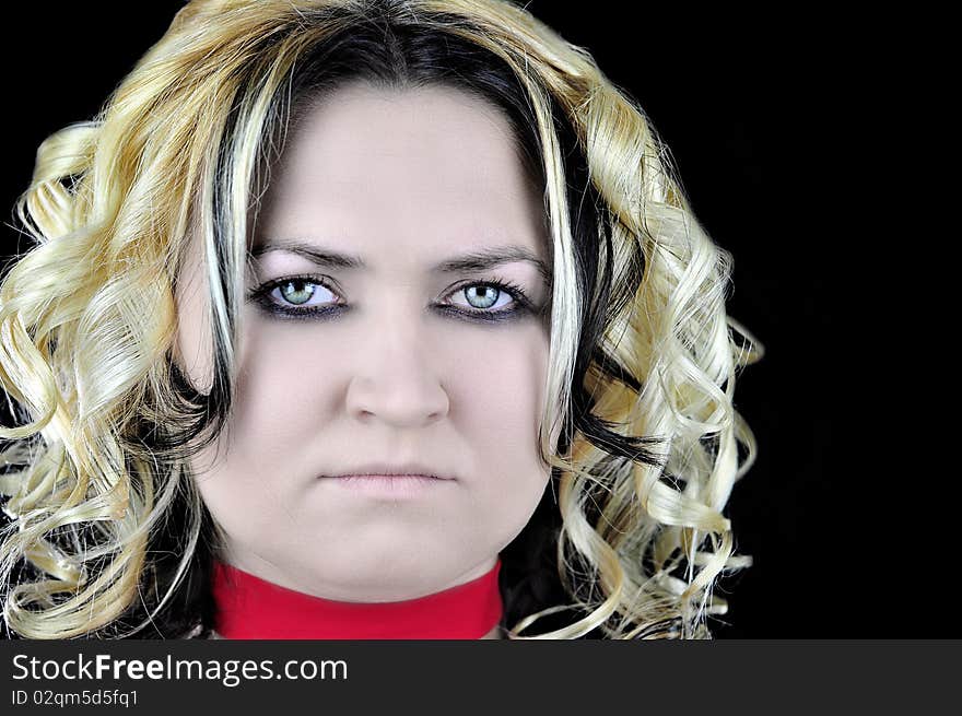 The ghost of woman with white face green eyes and red ribbon on neck.