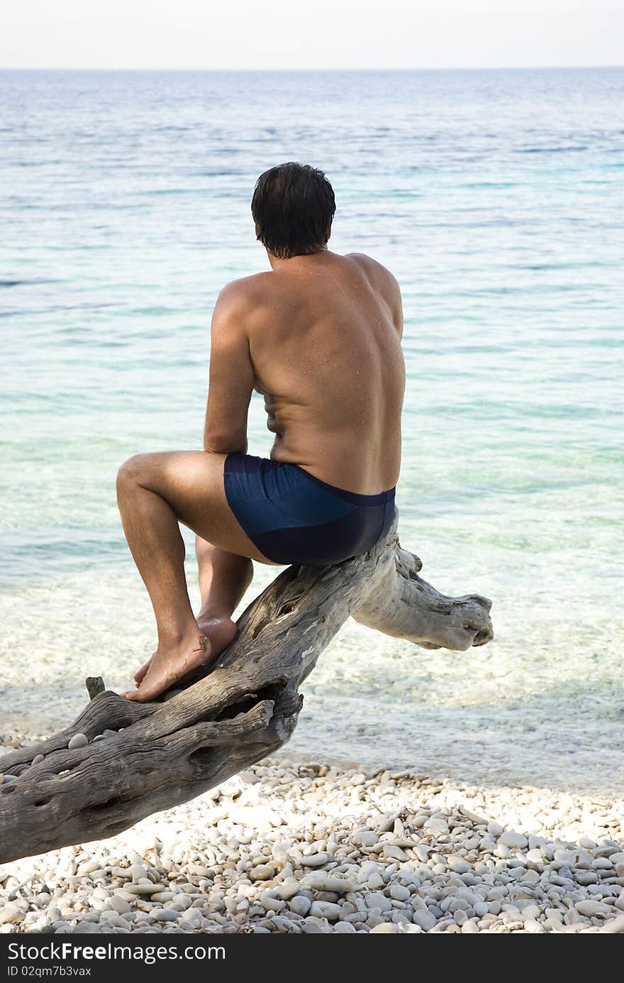 Man sitting on beach