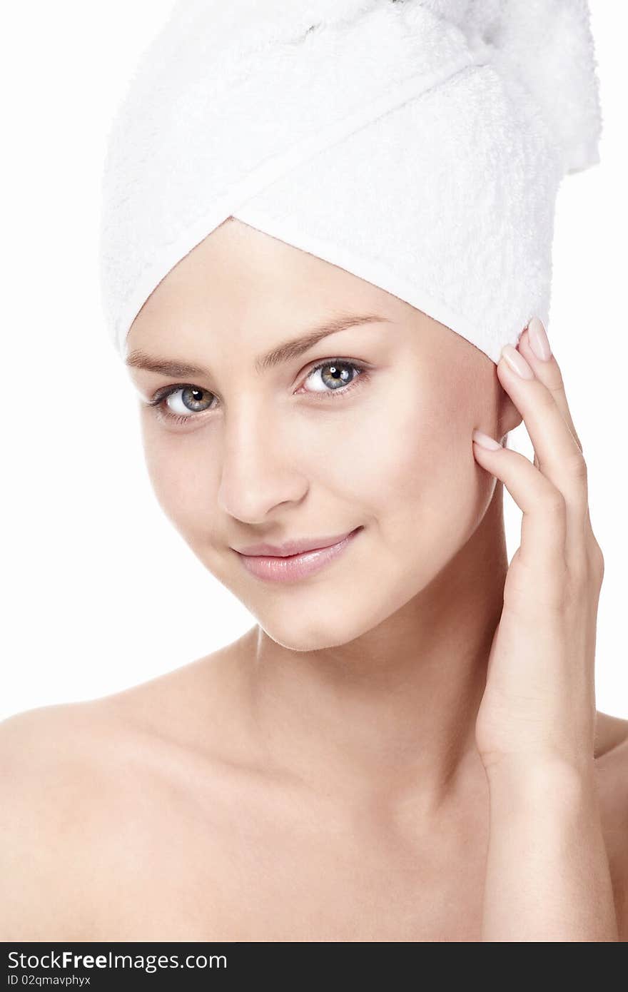 Young attractive girl in the towel on a white background. Young attractive girl in the towel on a white background