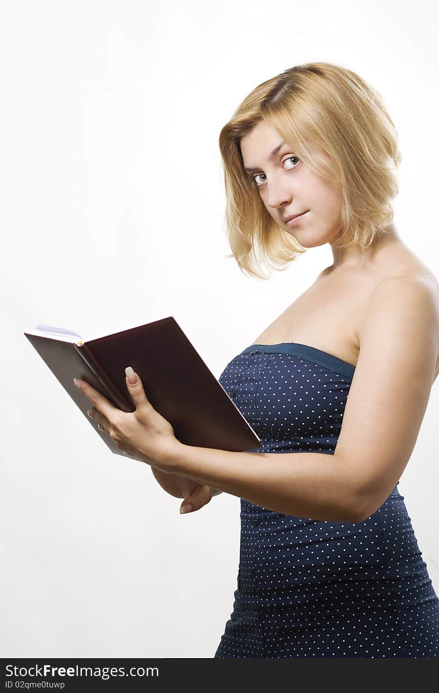 Young woman holding a book