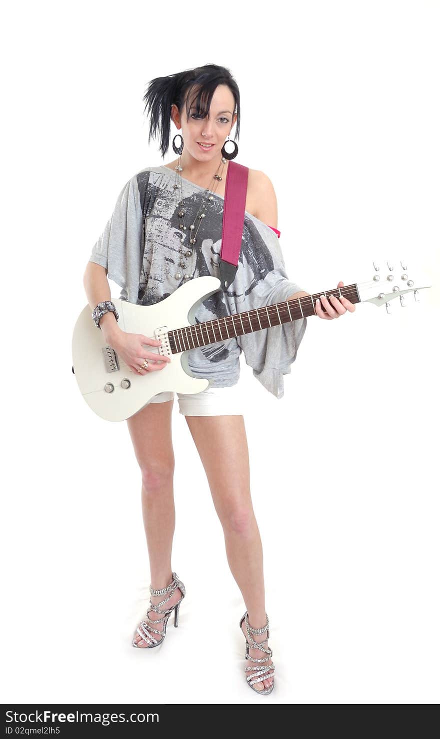 Photograph of sexy casual young woman isolated with guitar. Photograph of sexy casual young woman isolated with guitar