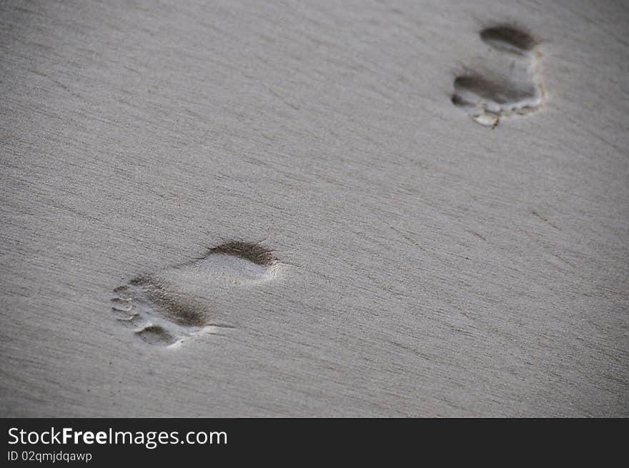 Foot prints in the sand