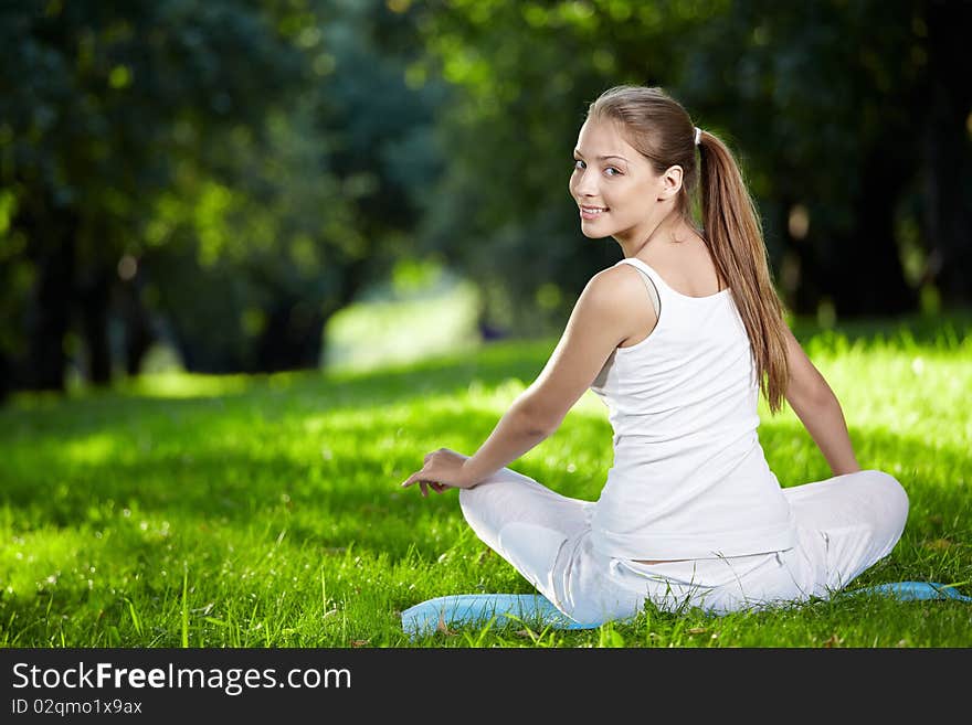 Young attractive girl in the park. Young attractive girl in the park