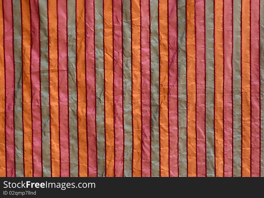 Texture of the coloured fabric in a strip. Texture of the coloured fabric in a strip