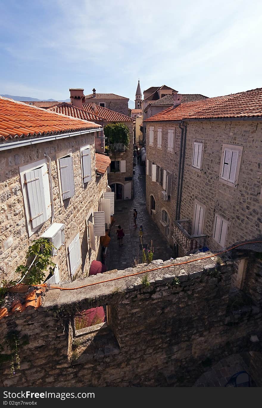 Street with tiled roofs in Budva old town, Montenegro. Street with tiled roofs in Budva old town, Montenegro