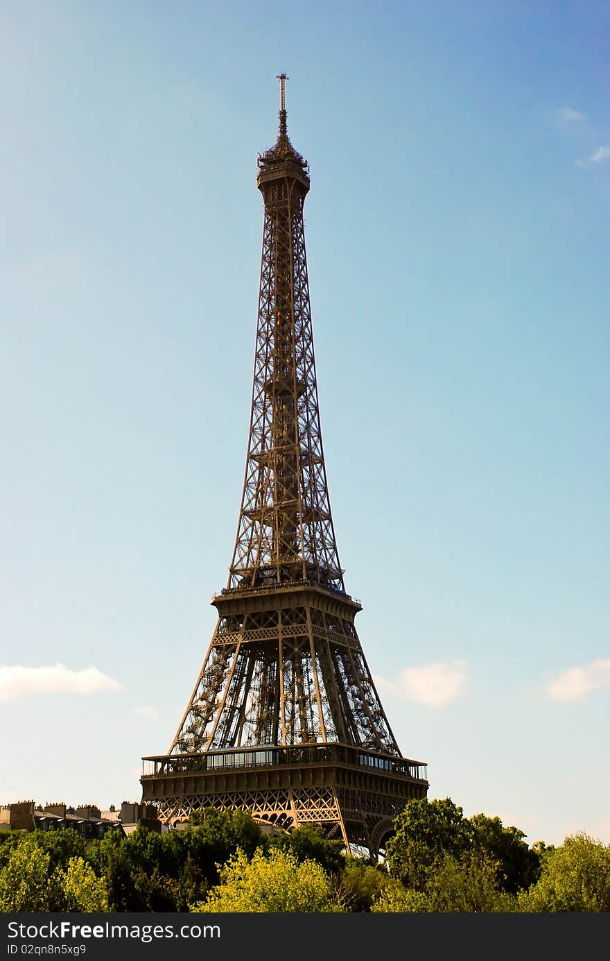 Eiffel Tower in Paris with sky and trees