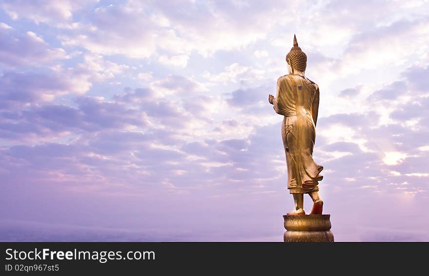 Walking Buddha statue at northen of thailand