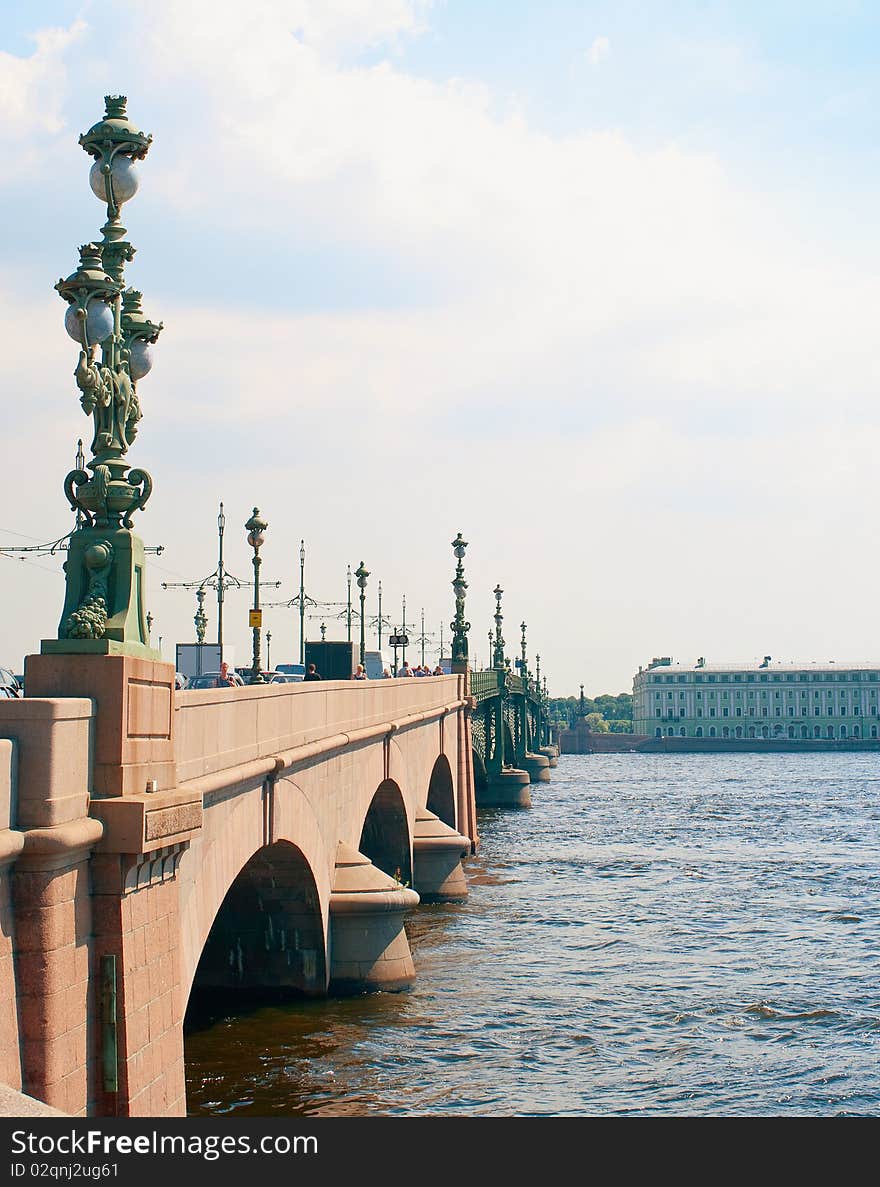 Russia, St. Petersburg. Troitskij Bridge against blue cloudy sky