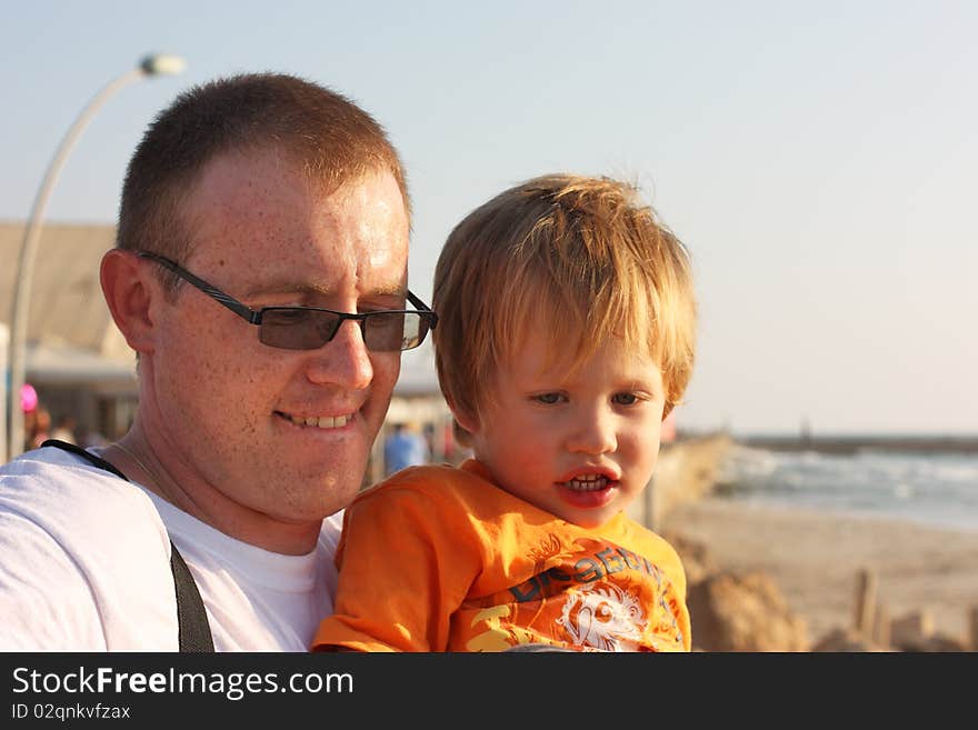 Father with son on the sea