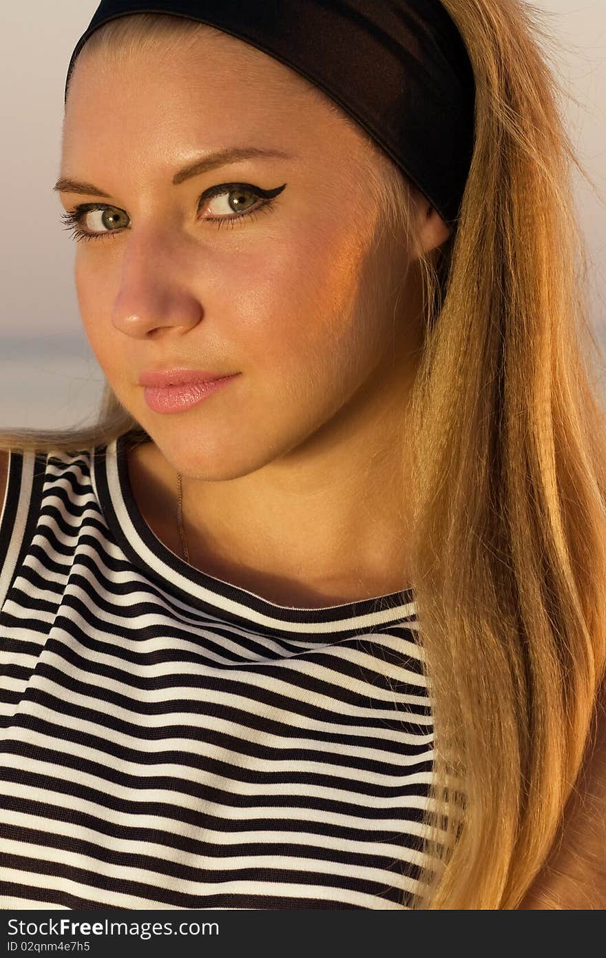 Photo of pretty girl in black headband. Photo of pretty girl in black headband