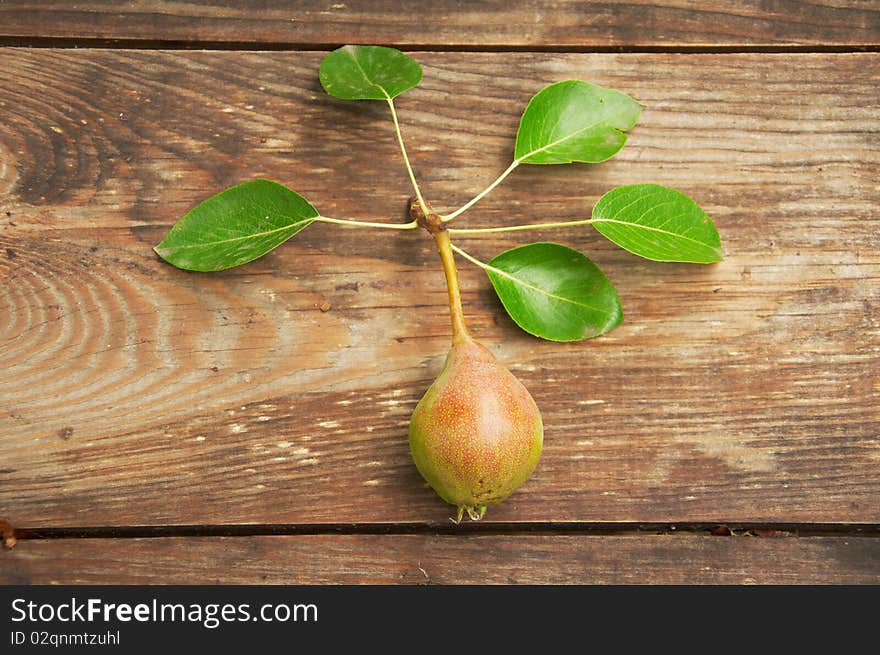 Pear on a wooden table