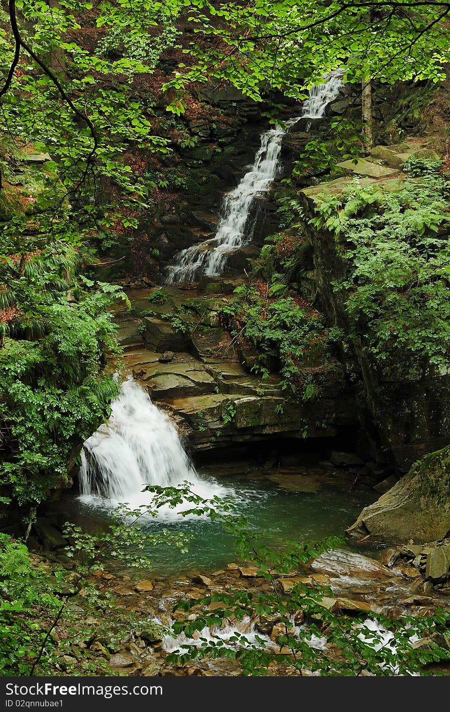 Peaceful view into forest with cascade. Peaceful view into forest with cascade.