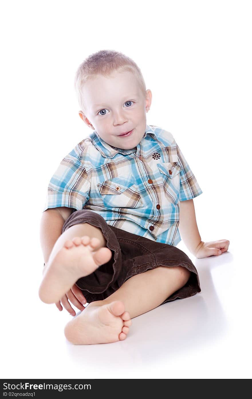 Photo of adorable young boy on white background