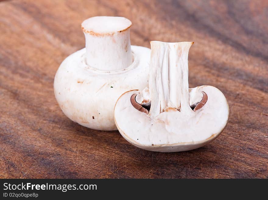 Fresh mushrooms on a chopping board. Fresh mushrooms on a chopping board