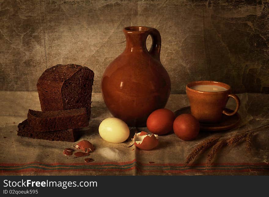 Modest country supper with rye bread, milk and egg