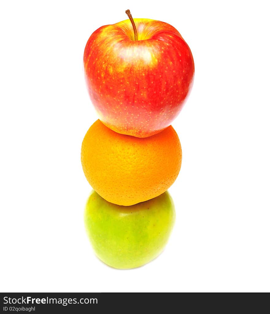 Stack of apple and orange on white background