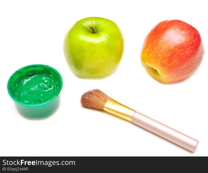 Apple and paints isolated on white background