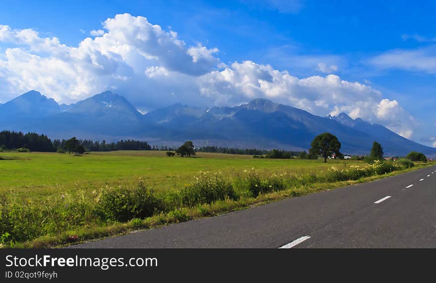 Road in Slovakia in front of the High Tatras