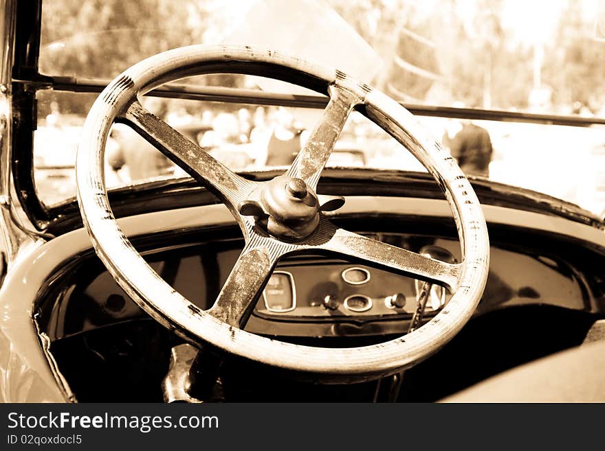 Close up of steering whell on an old car