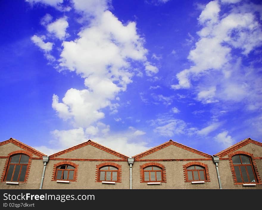 Blue sky and stone building. Blue sky and stone building