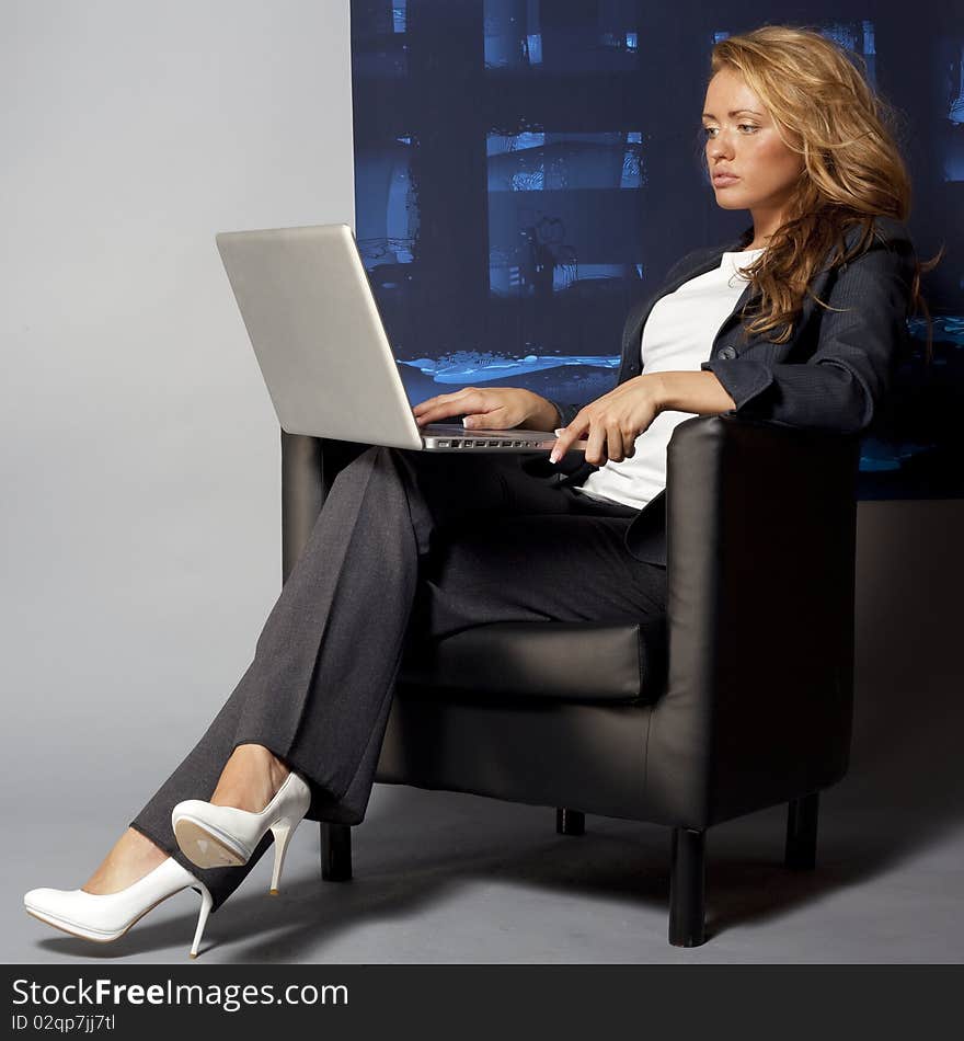 Young businesswoman sitting