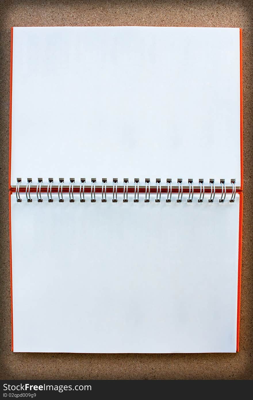 Blank twin face notebook on wood board