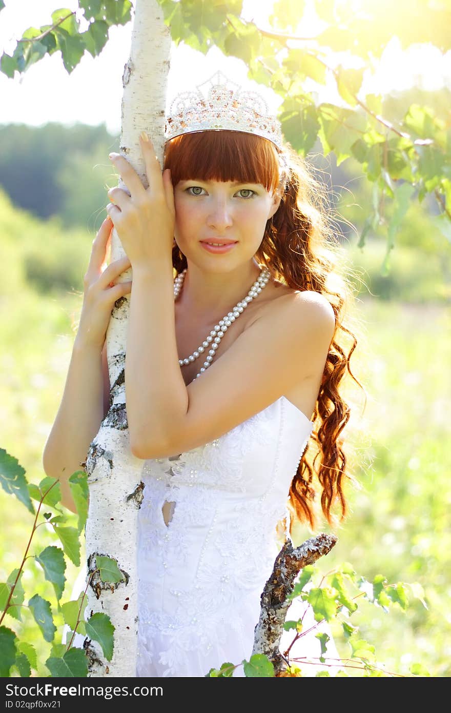 Beautiful girl near to a birch. Beautiful girl near to a birch