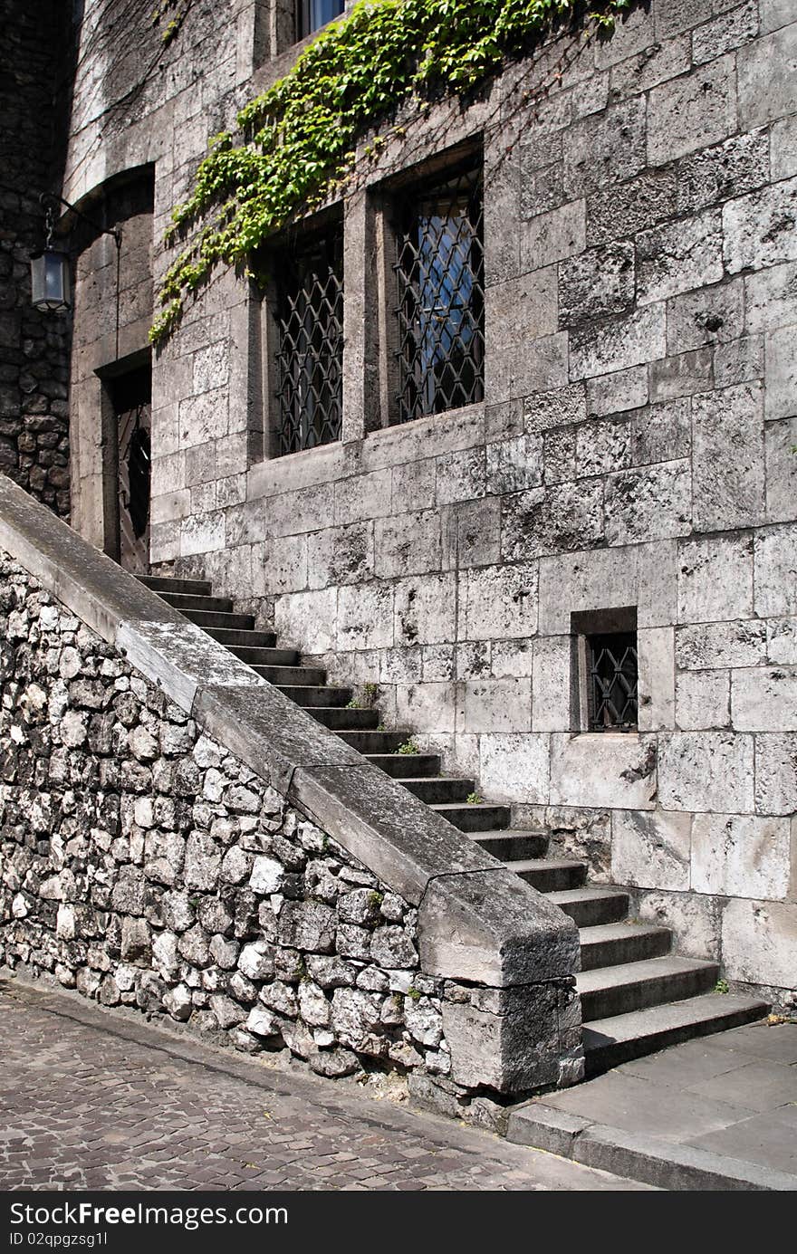 Ancient steps on the wall of the Exterior castle - side view. Ancient steps on the wall of the Exterior castle - side view.