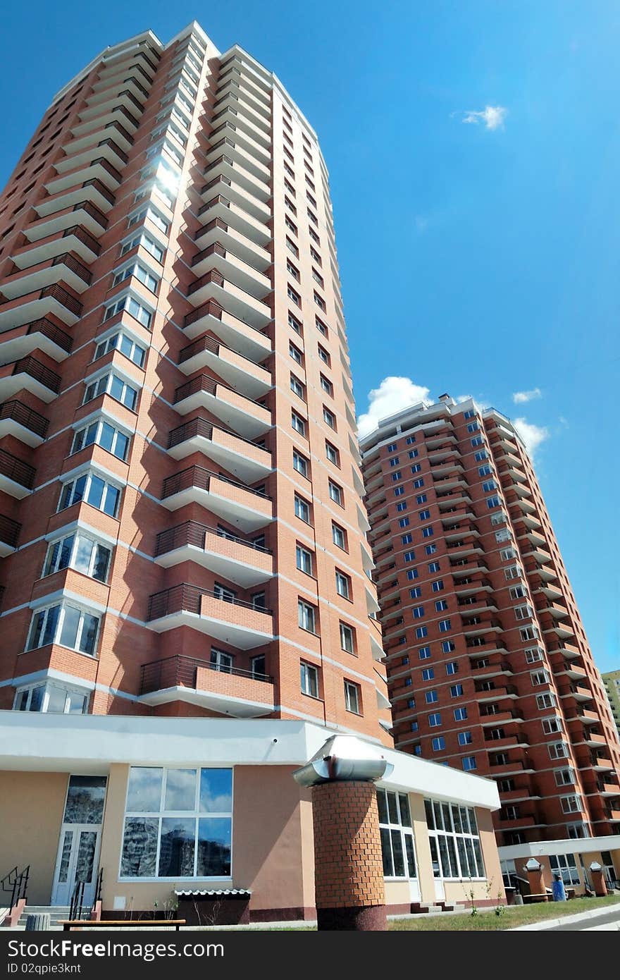 Modern apartment houses against blue sky. Modern apartment houses against blue sky