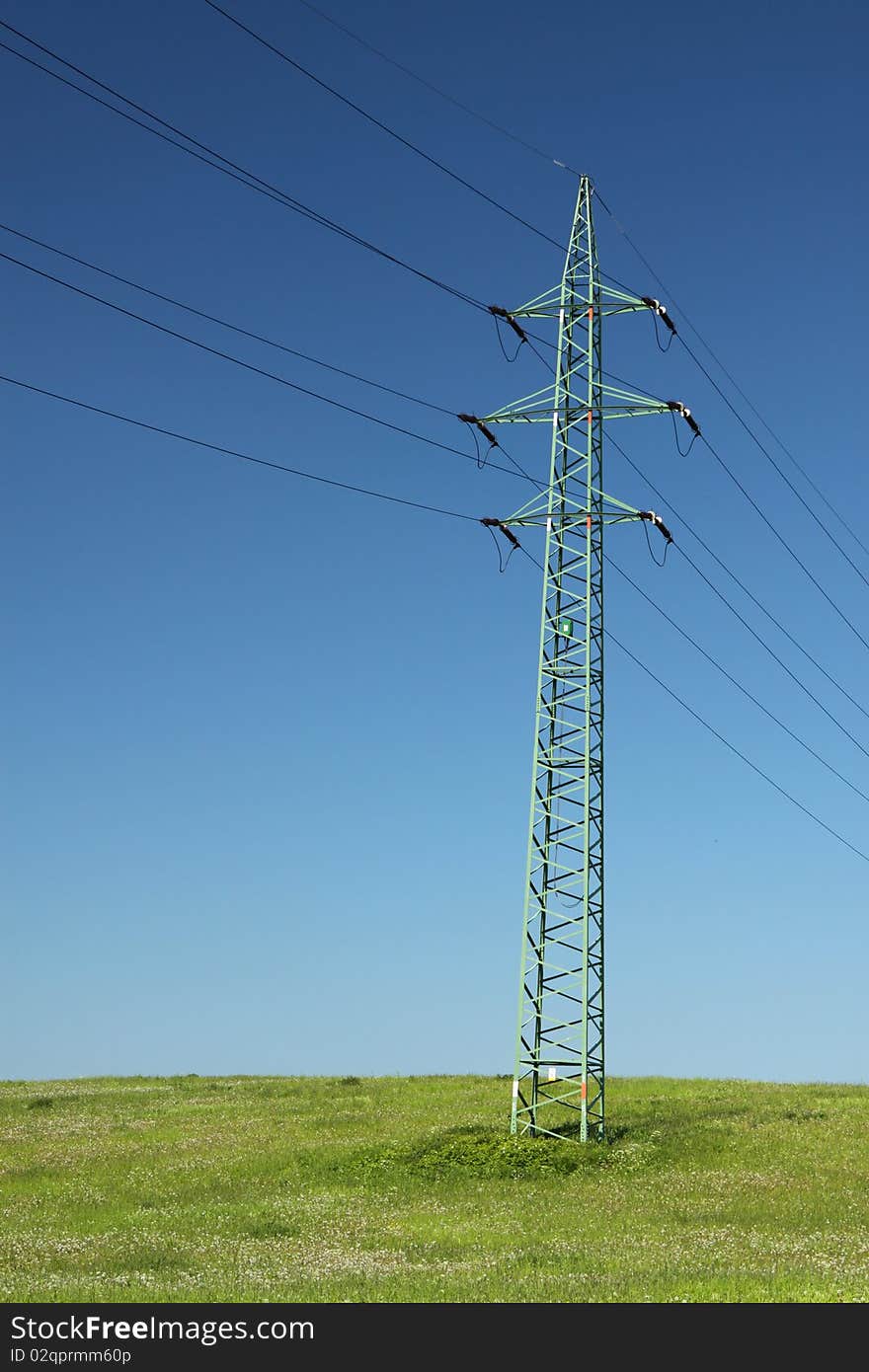 Single electric line pole on the grass field. Single electric line pole on the grass field