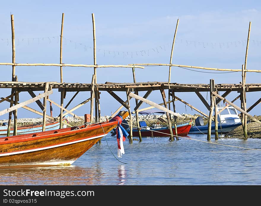 Traditional Thai long tail boats in a quiet bay (Koh Samui)