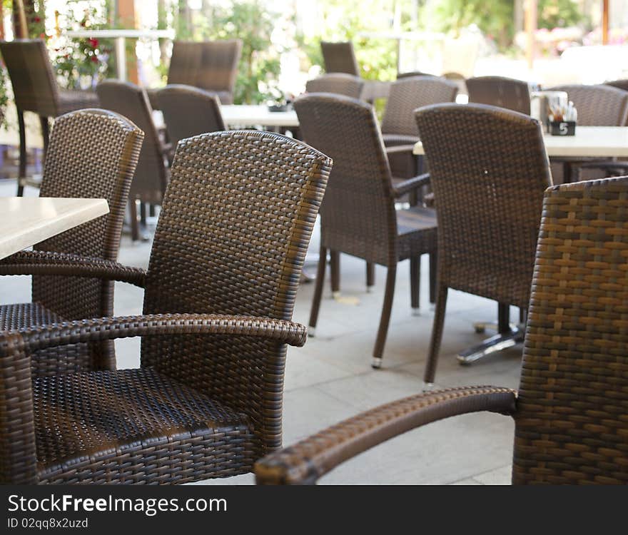 Restaurant tables with wicker chairs