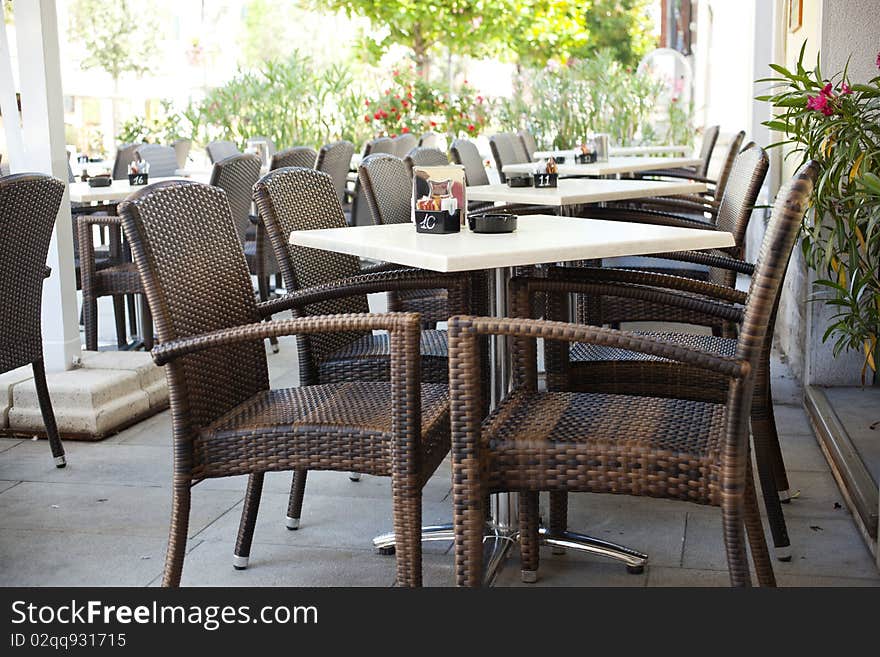 Restaurant tables with wicker chairs