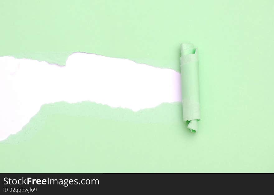 Ripped green Paper on yellow background. Ripped green Paper on yellow background