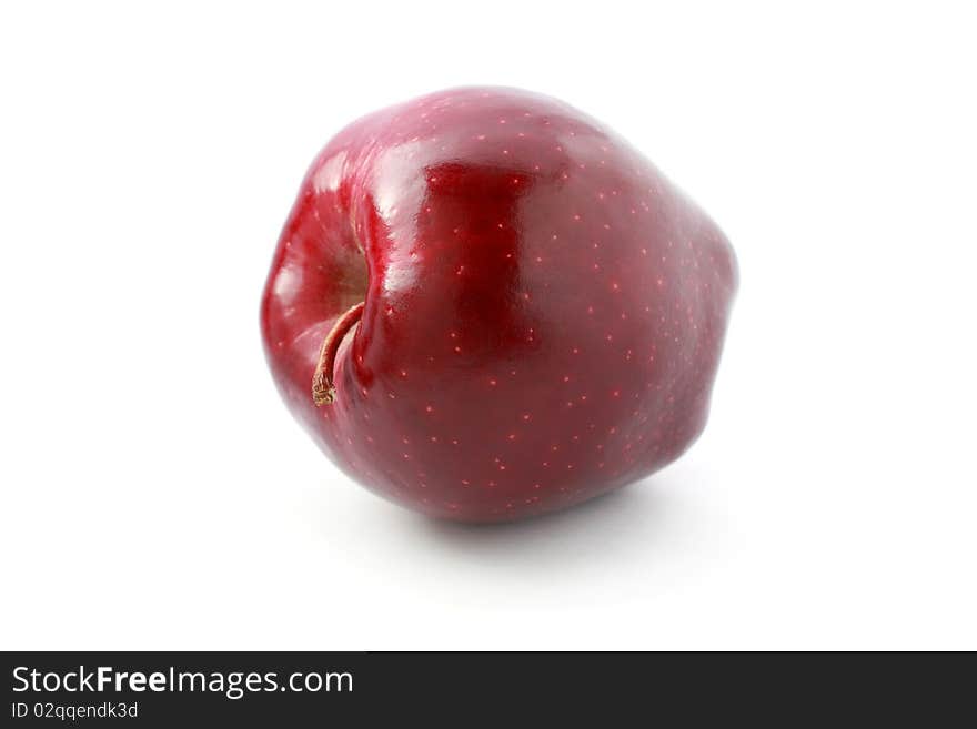 A perfect red apple isolated on white background. A perfect red apple isolated on white background.