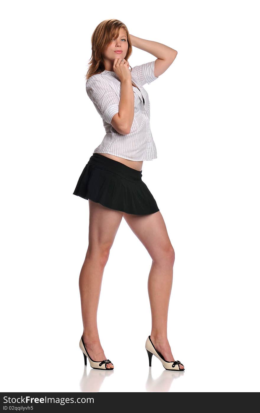 Young blond model posing isolated on a white background