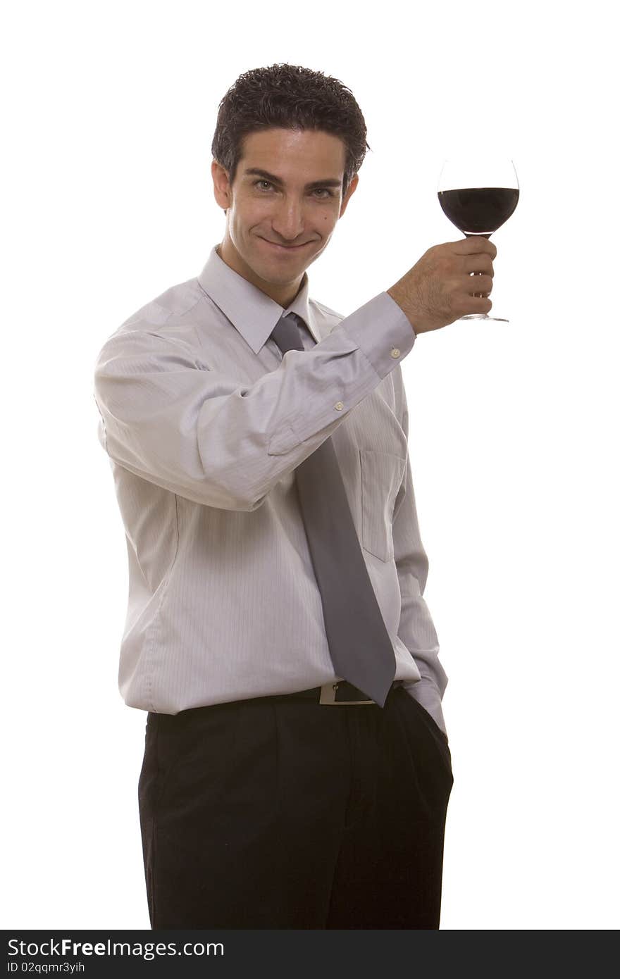 Businessman celebrating his success with a glass of red wine