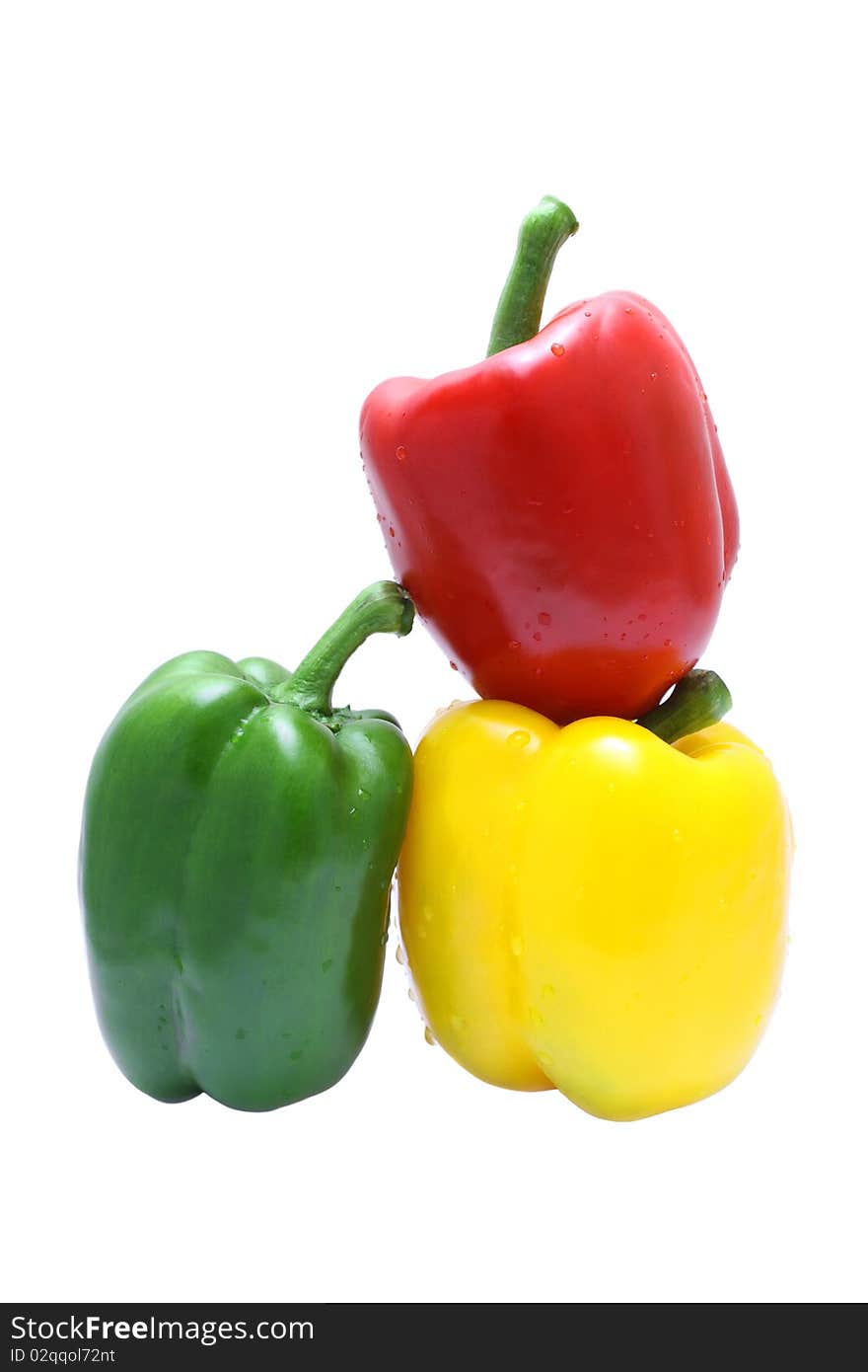 Close up of red, yellow and green pepper isolated on white background. Close up of red, yellow and green pepper isolated on white background.