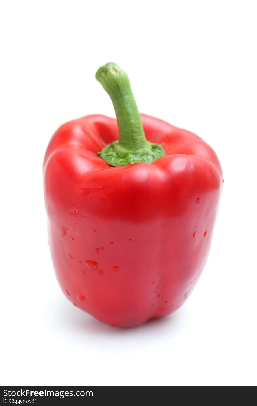 Close up of a red bell pepper isolated on white background.