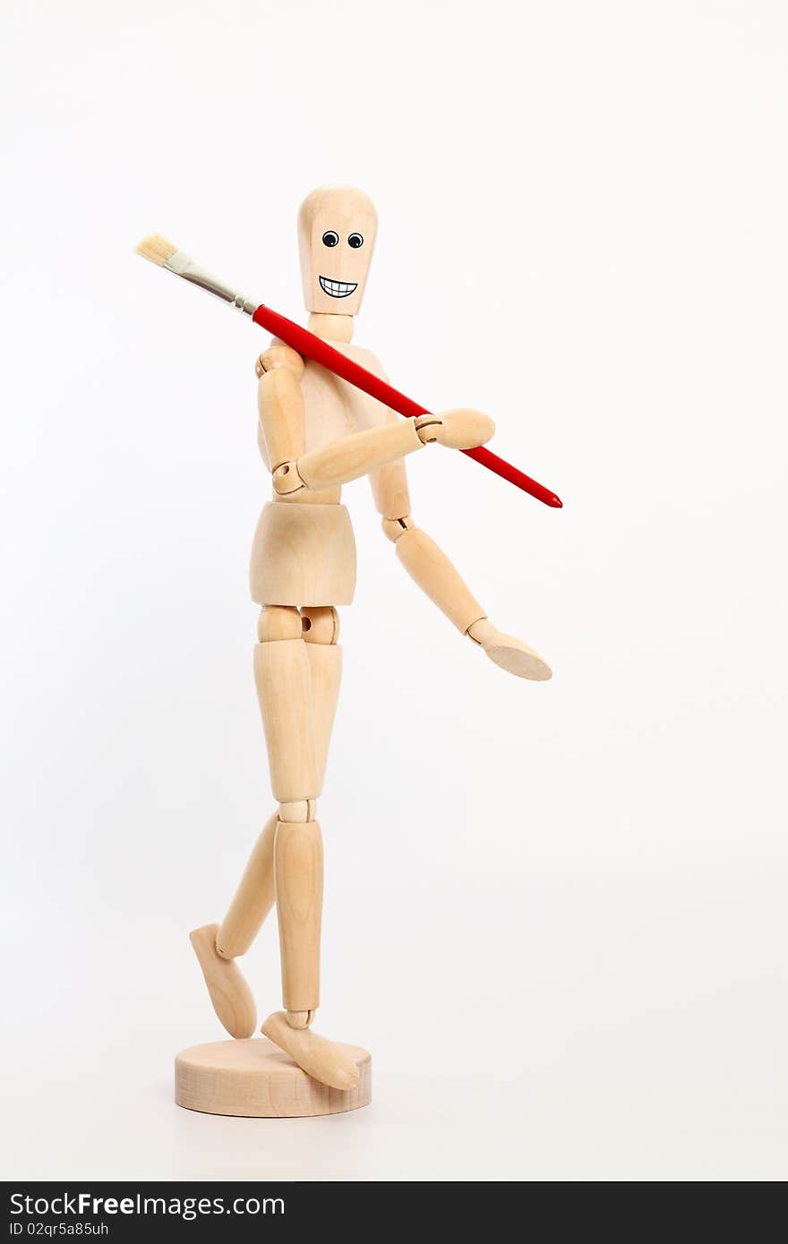 Wooden dummy with red brush