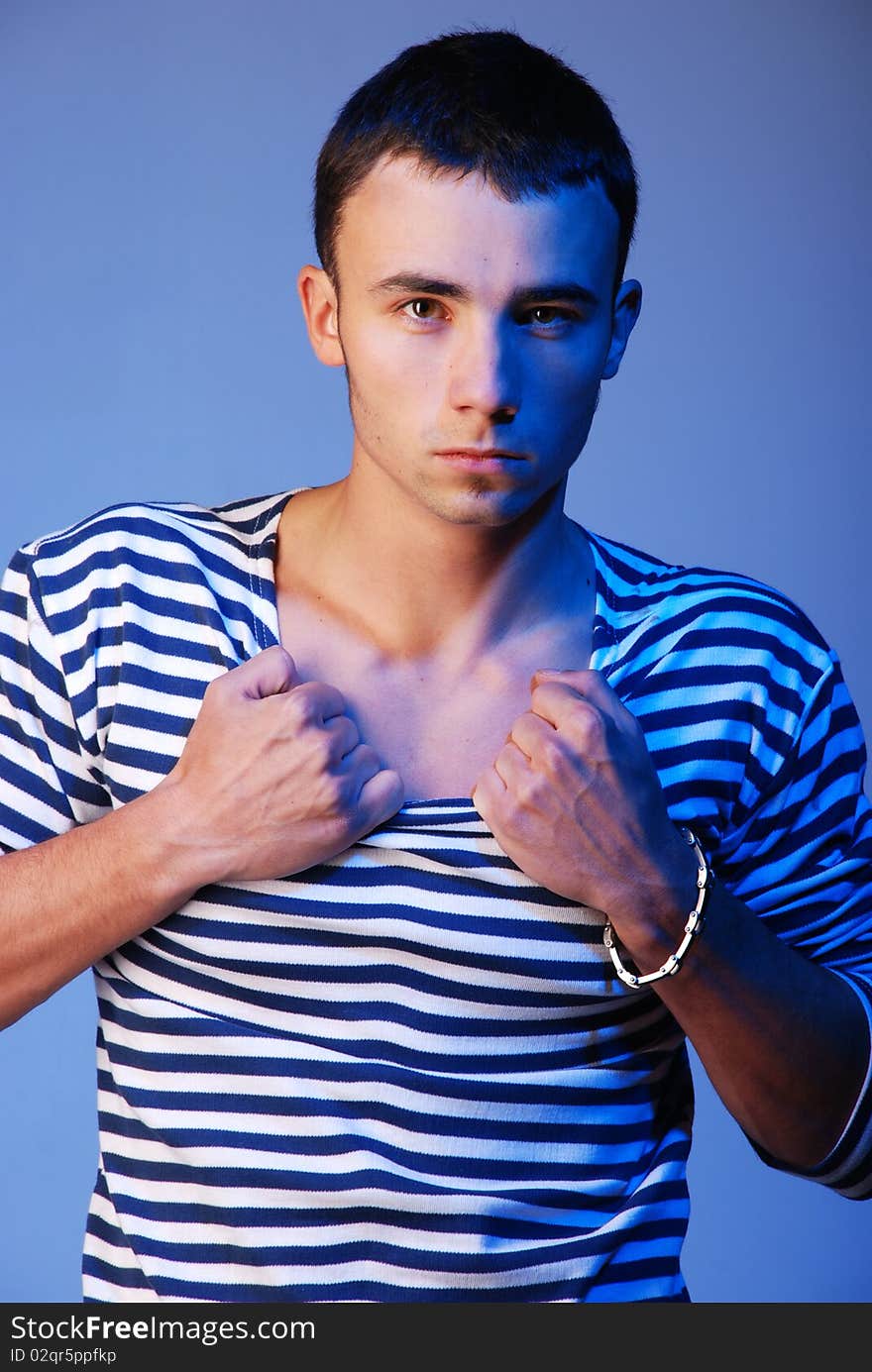 Young atractive man in striped jersey