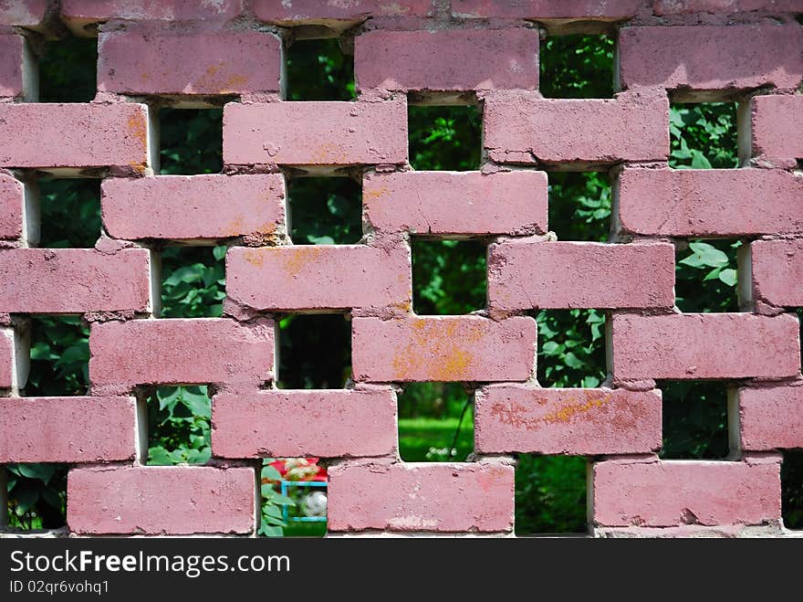 Wall from the painted brick with holes. Wall from the painted brick with holes